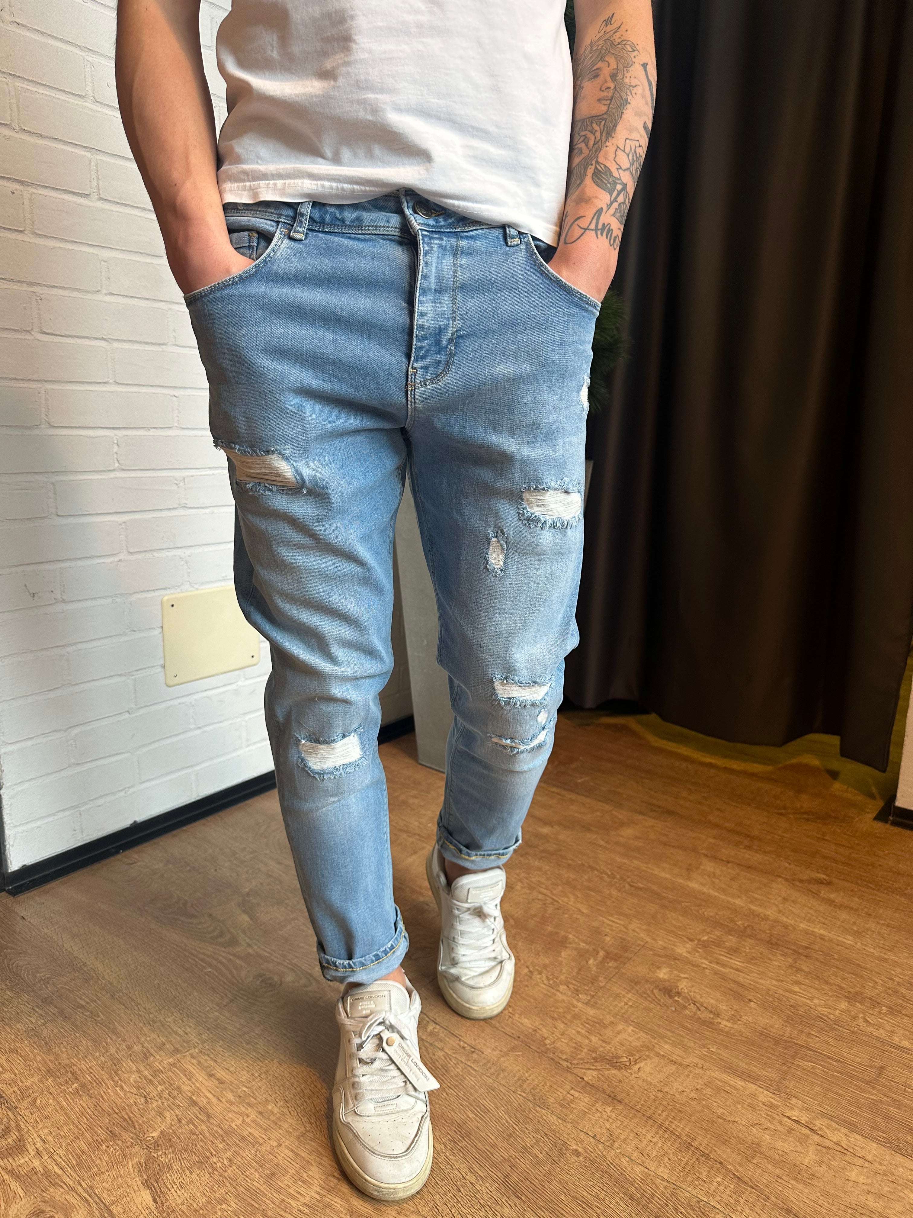 JEANS TIKAL CARROT FIT CON ABRASIONI PONT